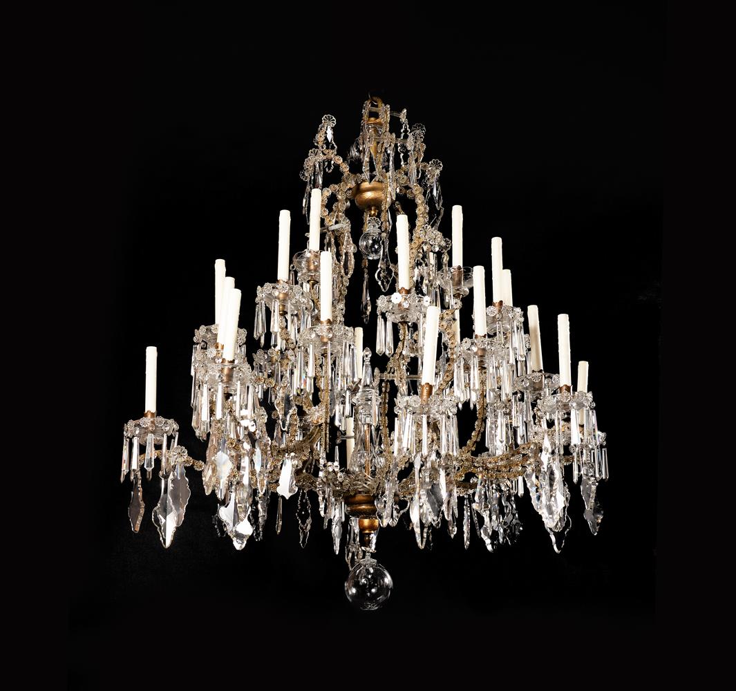 A LARGE ITALIAN CUT-GLASS AND GILT IRON TWENTY EIGHT-LIGHT CHANDELIER, PIEDMONTESE