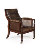 A REGENCY MAHOGANY AND GREEN LEATHER LIBRARY ARMCHAIR, EARLY 19TH CENTURY