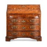 A DUTCH WALNUT AND SPECIMEN MARQUETRY SERPENTINE FRONTED BUREAU, LATE 18TH CENTURY