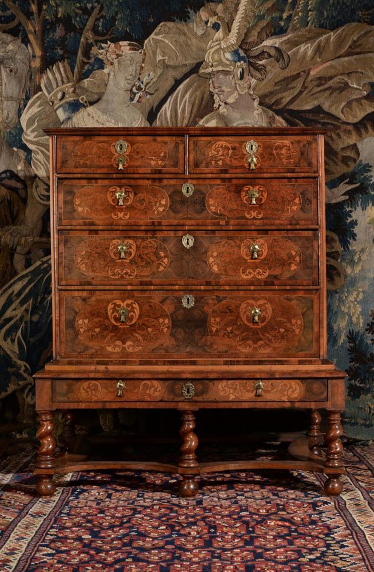 A FINE AND RARE WILLIAM & MARY WALNUT, FRUITWOOD, OLIVE-WOOD OYSTER-VENEERED CHEST ON STAND