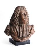 A TERRACOTTA BUST OF A NOBLEMAN, FRENCH OR ENGLISH, POSSIBLY EARLY 18TH CENTURY