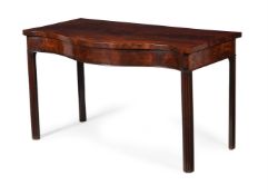 A GEORGE III FIGURED MAHOGANY SERPENTINE FRONTED SERVING OR SIDE TABLE, CIRCA 1770