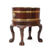 A MAHOGANY AND BRASS BOUND OVAL WINE COOLER ON STAND, IN 18TH CENTURY STYLE, 19TH CENTURY