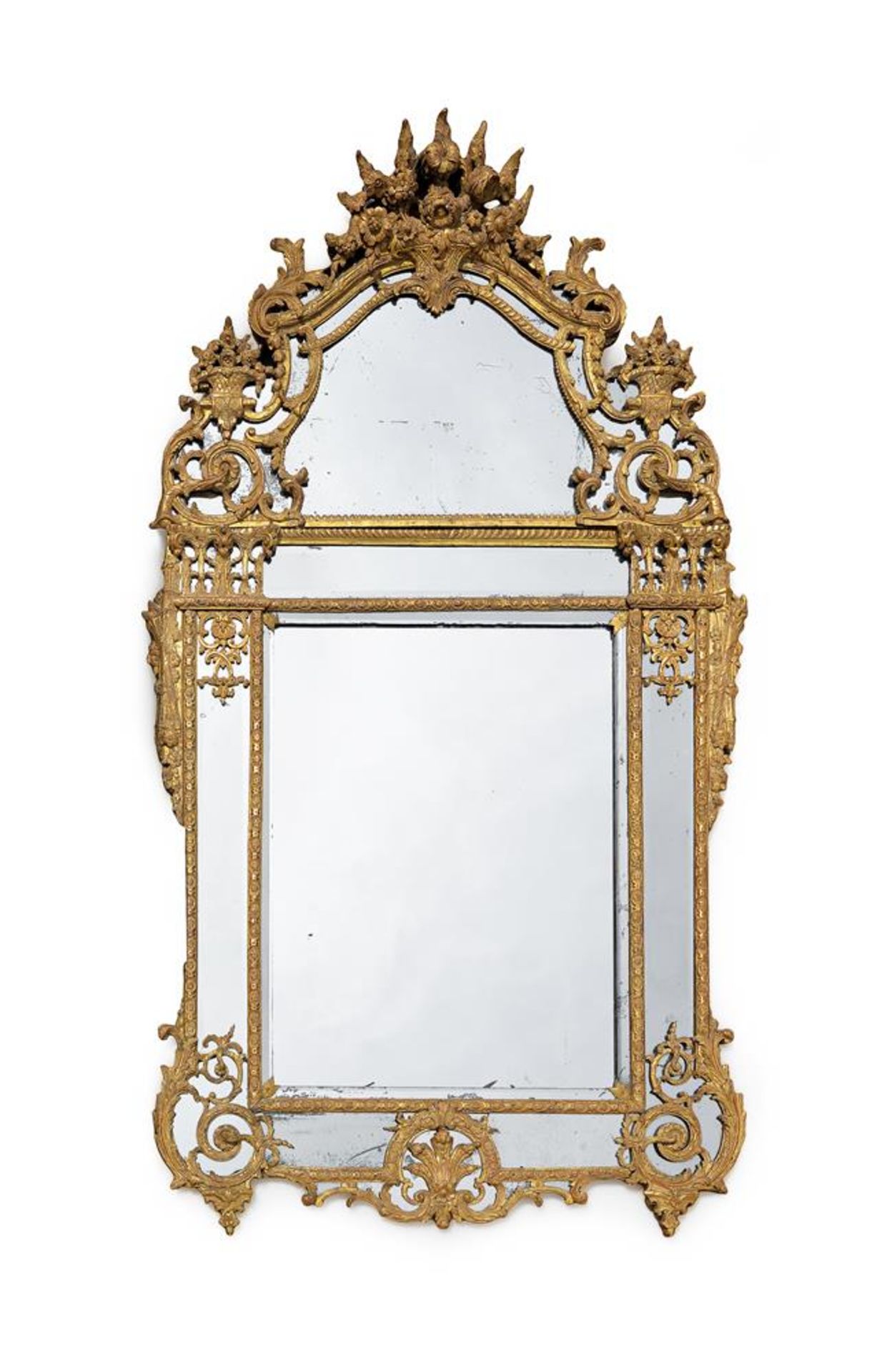 A REGENCÉ CARVED GILTWOOD MIRROR, INSCRIBED 'E. Caris, Faugeais, Chab', DATED 1719 TO REVERSE