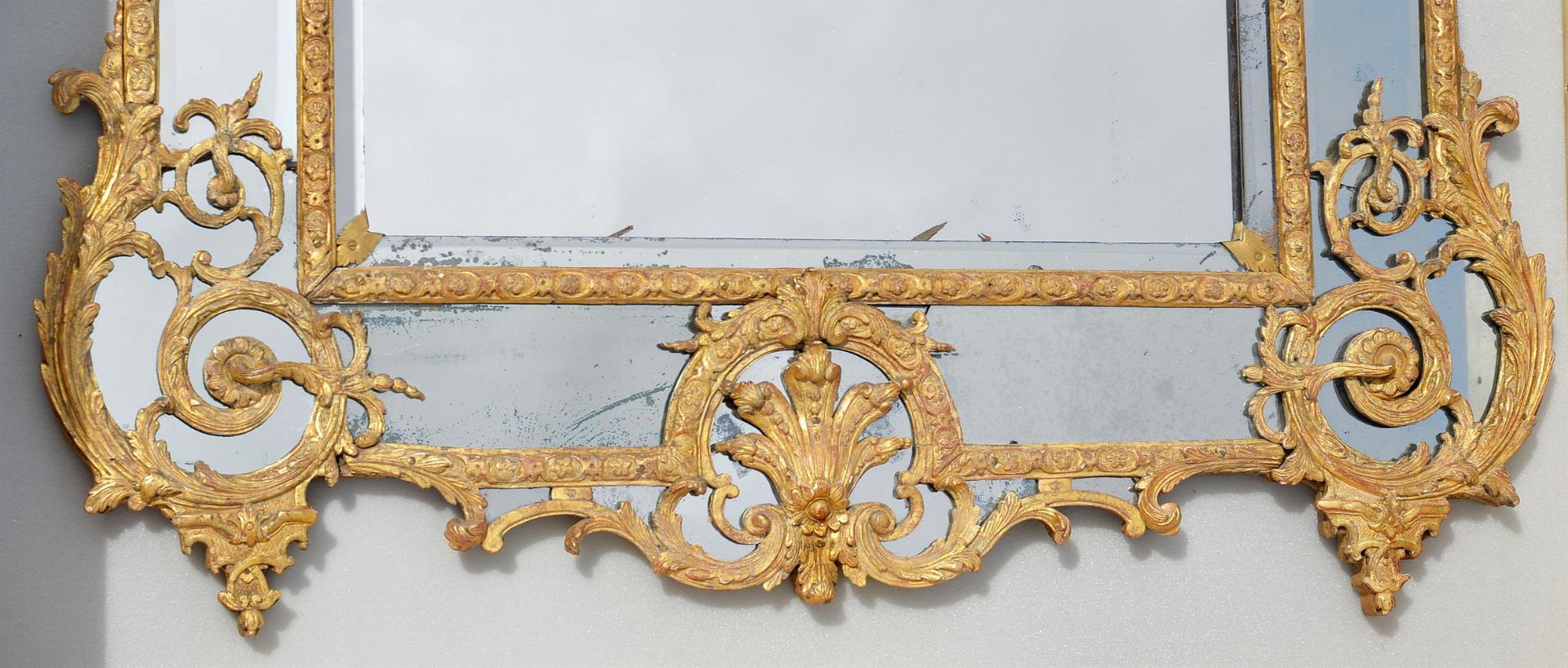 A REGENCÉ CARVED GILTWOOD MIRROR, INSCRIBED 'E. Caris, Faugeais, Chab', DATED 1719 TO REVERSE - Image 4 of 4