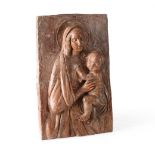 A TERRACOTTA PLAQUE OF THE MADONNA AND CHILD, ITALIAN, PROBABLY 18TH CENTURY