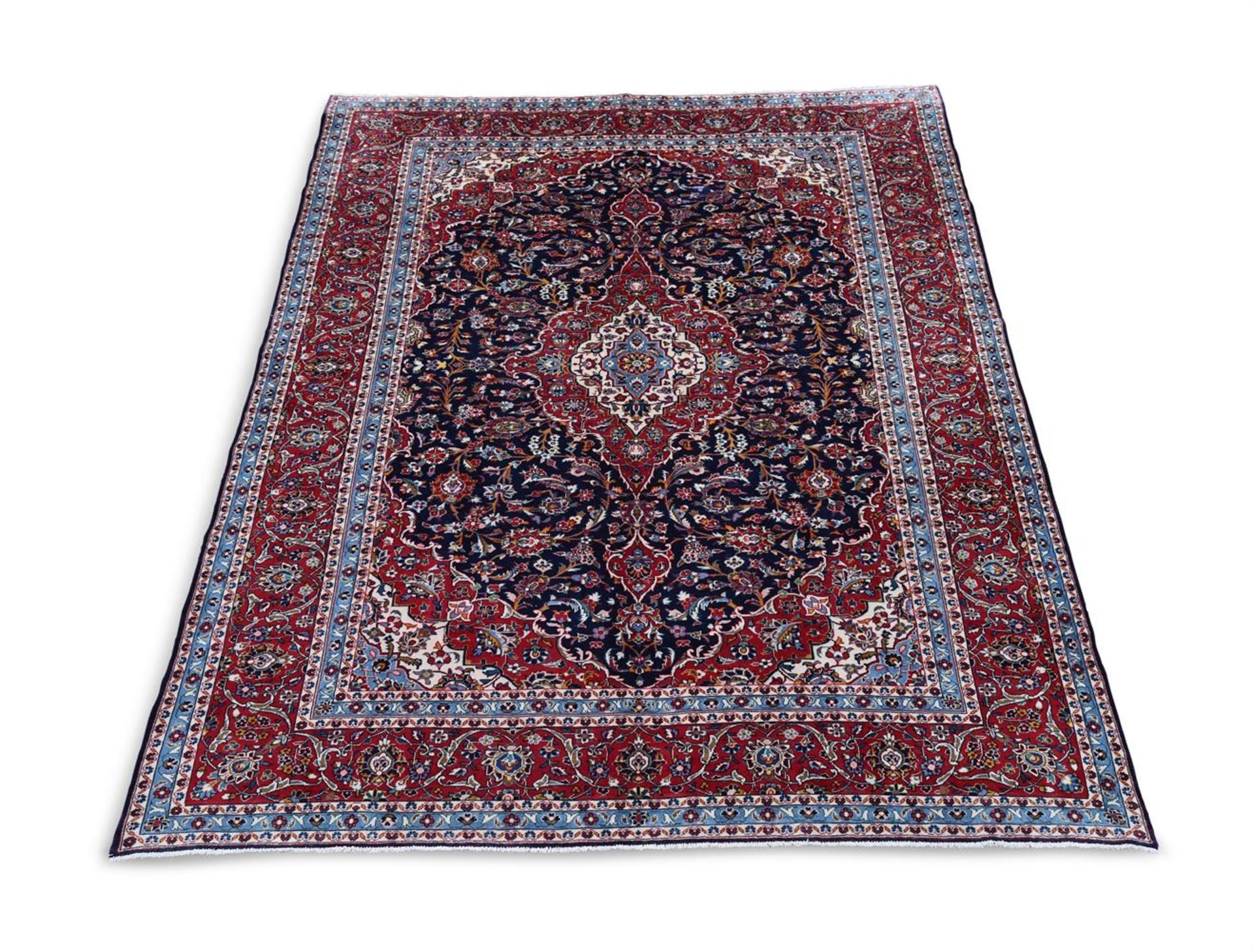 A KASHAN CARPET, approximately 410 x 290cm