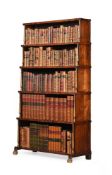 Y A REGENCY ROSEWOOD AND PARCEL GILT 'WATERFALL' OPEN BOOKCASE, CIRCA 1815