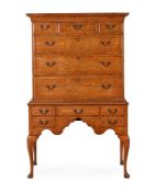 A GEORGE II BURR WALNUT, BURR OAK AND CHESTNUT CHEST ON STAND, MID 18TH CENTURY