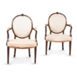 A PAIR OF GEORGE III MAHOGANY ARMCHAIRS, IN THE MANNER OF GEORGE HEPPLEWHITE, CIRCA 1780