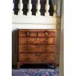 A GEORGE I FIGURED WALNUT AND FEATHER BANDED BACHELOR'S CHEST OF DRAWERS, CIRCA 1720