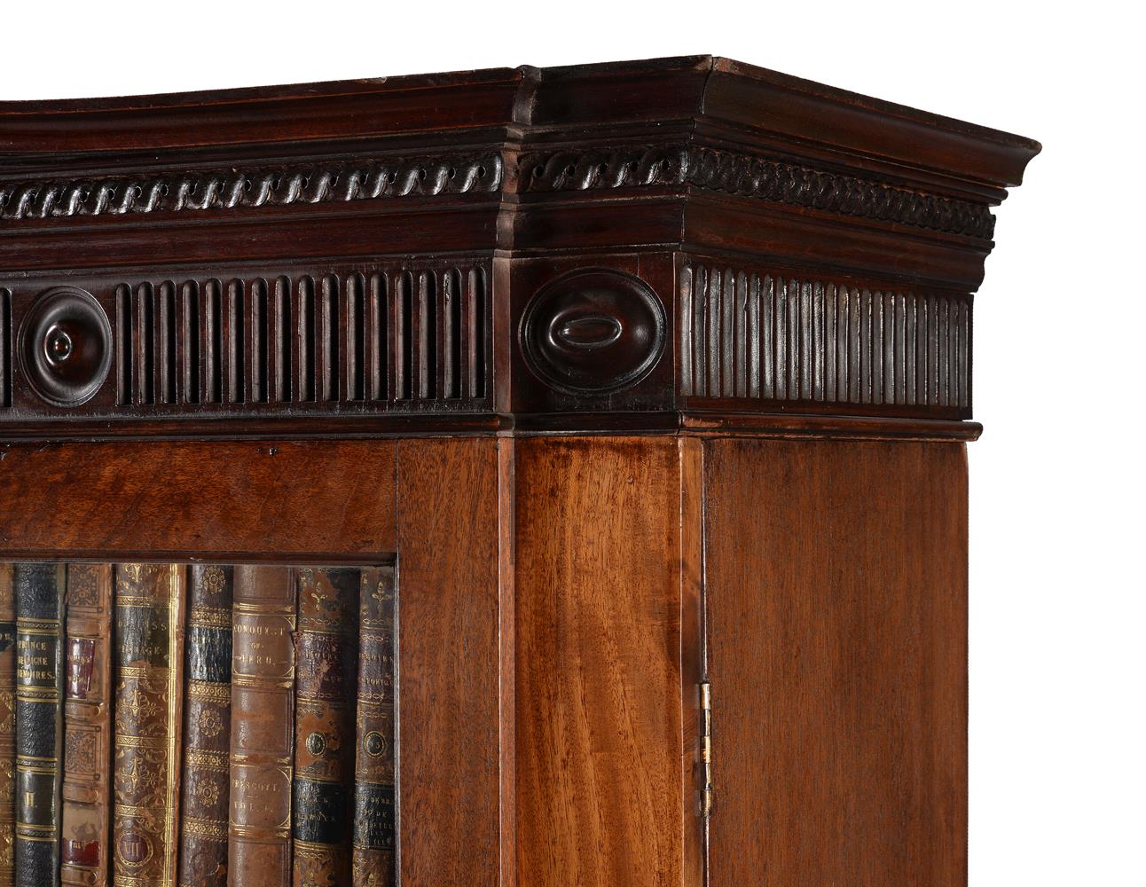 A GEORGE III MAHOGANY LIBRARY BOOKCASE, IN THE MANNER OF THOMAS CHIPPENDALE THE YOUNGER - Image 4 of 6