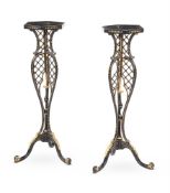 A PAIR OF BLACK PAINTED AND PARCEL GILT TORCHERE STANDS, IN GEORGE III STYLE, 20TH CENTURY
