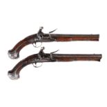 BENNETT LONDON; A PAIR OF WALNUT AND SILVER-METAL MOUNTED HOLSTER PISTOLS