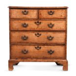 A WALNUT AND CROSSBANDED CHEST OF DRAWERS, MID 18TH CENTURY AND LATER