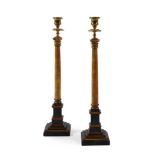 A TALL PAIR OF BRASS MOUNTED PAINTED COLUMNAR CANDLESTICKS, 20TH CENTURY