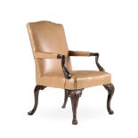 A GEORGE III CARVED MAHOGANY AND UPHOLSTERED ARMCHAIR, IN THE MANNER OF WRIGHT & ELWICK