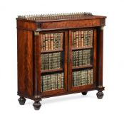 Y A GEORGE IV FIGURED MAHOGANY AND GILT METAL MOUNTED CABINET OR BOOKCASE, CIRCA 1825