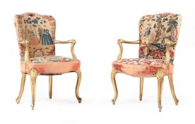 A PAIR OF GEORGE III GILTWOOD AND NEEDLEWORK UPHOLSTERED ARMCHAIRS, CIRCA 1775