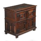 AN UNUSUAL COMMONWEALTH OAK ENCLOSED CHEST OF DRAWERS, CIRCA 1650 AND LATER