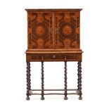 Y A WILLIAM & MARY ROSEWOOD, KINGWOOD AND OLIVEWOOD OYSTER VENEERED CABINET ON STAND, CIRCA 1690