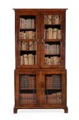 A GEORGE I WALNUT AND FEATHER-BANDED BOOKCASE, OF SMALL PROPORTIONS, CIRCA 1720