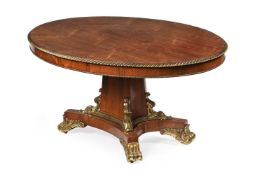 Y A GEORGE IV ROSEWOOD AND GILT METAL MOUNTED OVAL CENTRE TABLE, CIRCA 1830