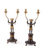 AFTER JEAN-SIMON DEVERBERIE (1764-1824), A RARE PAIR OF ORMOLU AND PATINATED BRONZE CANDELABRA