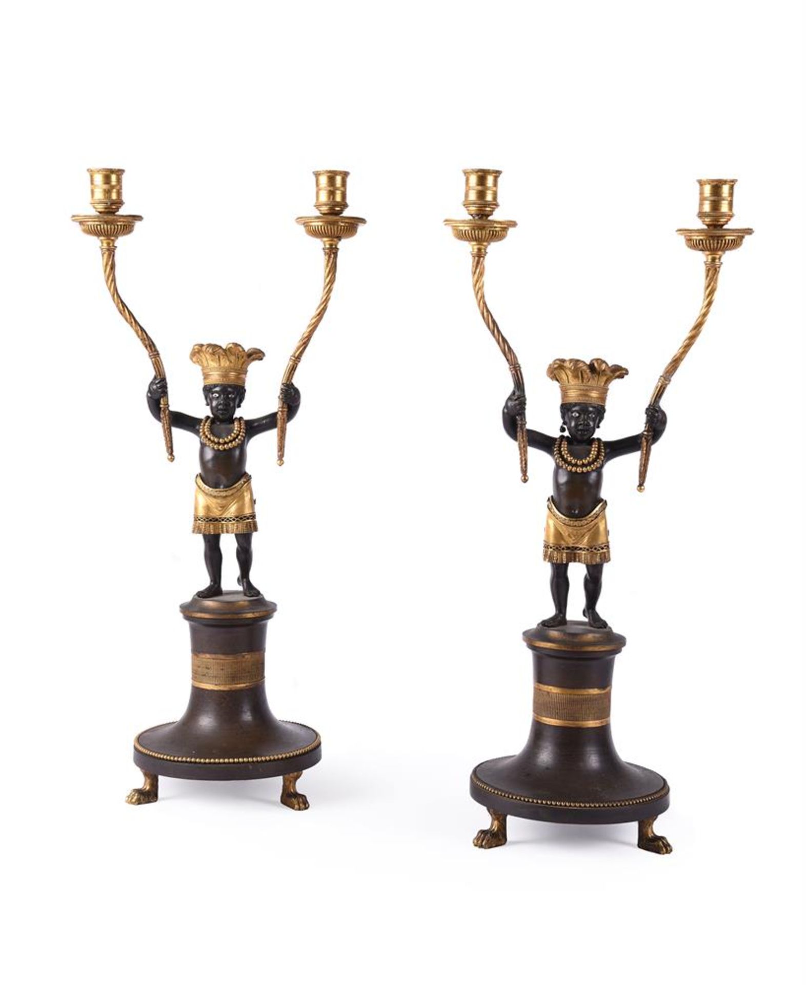 AFTER JEAN-SIMON DEVERBERIE (1764-1824), A RARE PAIR OF ORMOLU AND PATINATED BRONZE CANDELABRA