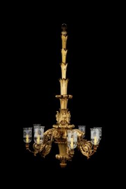 A LARGE AND IMPRESSIVE GILT AND LACQUERED BRASS EIGHT BRANCH CHANDELIER, CIRCA 1825 AND LATER