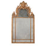 A REGENCE CARVED GILTWOOD AND GESSO MIRROR, CIRCA 1720