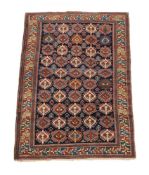 A CAUCASIAN RUG, PROBABLY SHIRVAN, approximately 192 x 127cm