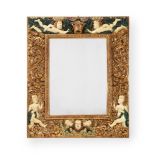 A CONTINENTAL CARVED GILTWOOD AND PAINTED MIRROR, SOUTH GERMAN OR AUSTRIAN, 17TH CENTURY AND LATER