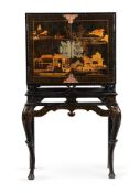 A BLACK LACQUER AND GILT CHINOISERIE DECORATED CABINET ON STAND, LATE 18TH OR EARLY 19TH CENTURY