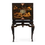 A BLACK LACQUER AND GILT CHINOISERIE DECORATED CABINET ON STAND, LATE 18TH OR EARLY 19TH CENTURY