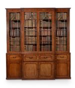 A REGENCY MAHOGANY AND EBONISED LIBRARY BOOKCASE, IN THE MANNER OF GILLOWS, CIRCA 1820