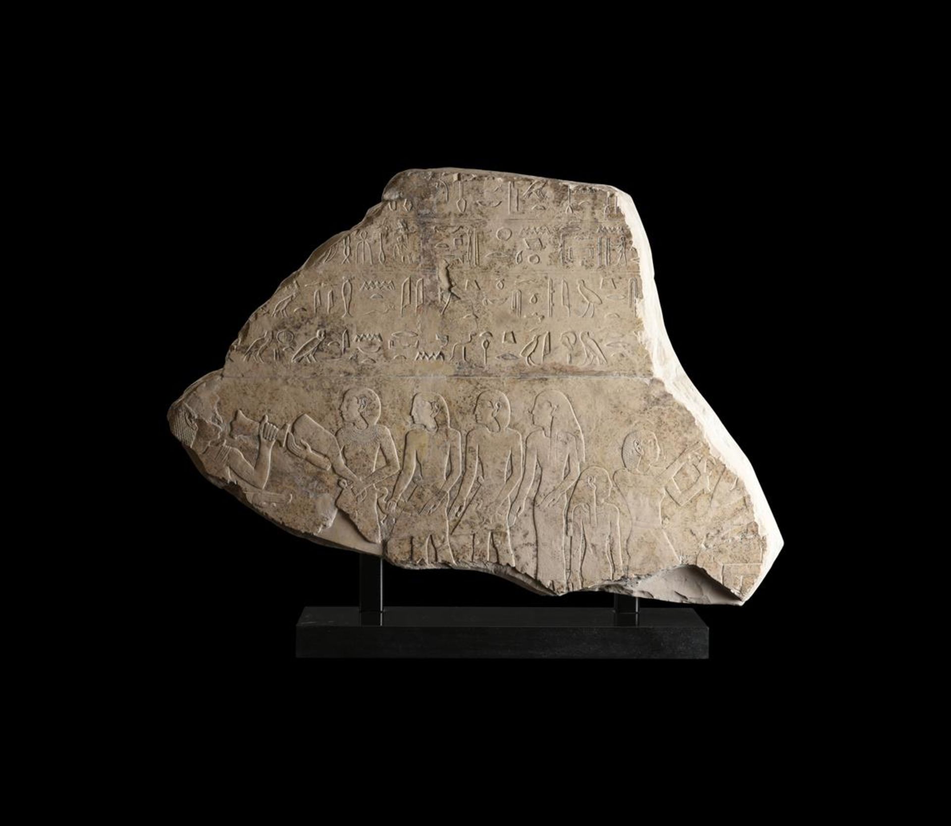 AN EGYPTIAN LIMESTONE STELE FRAGMENT, MIDDLE KINGDOM, 11TH-12TH DYNASTY, CIRCA 2050-1950 B.C.