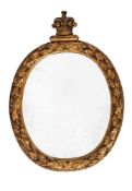A GEORGE IV GILTWOOD OVAL MIRROR CARVED WITH A CORONET, OAK LEAVES AND ACORNS, CIRCA 1830