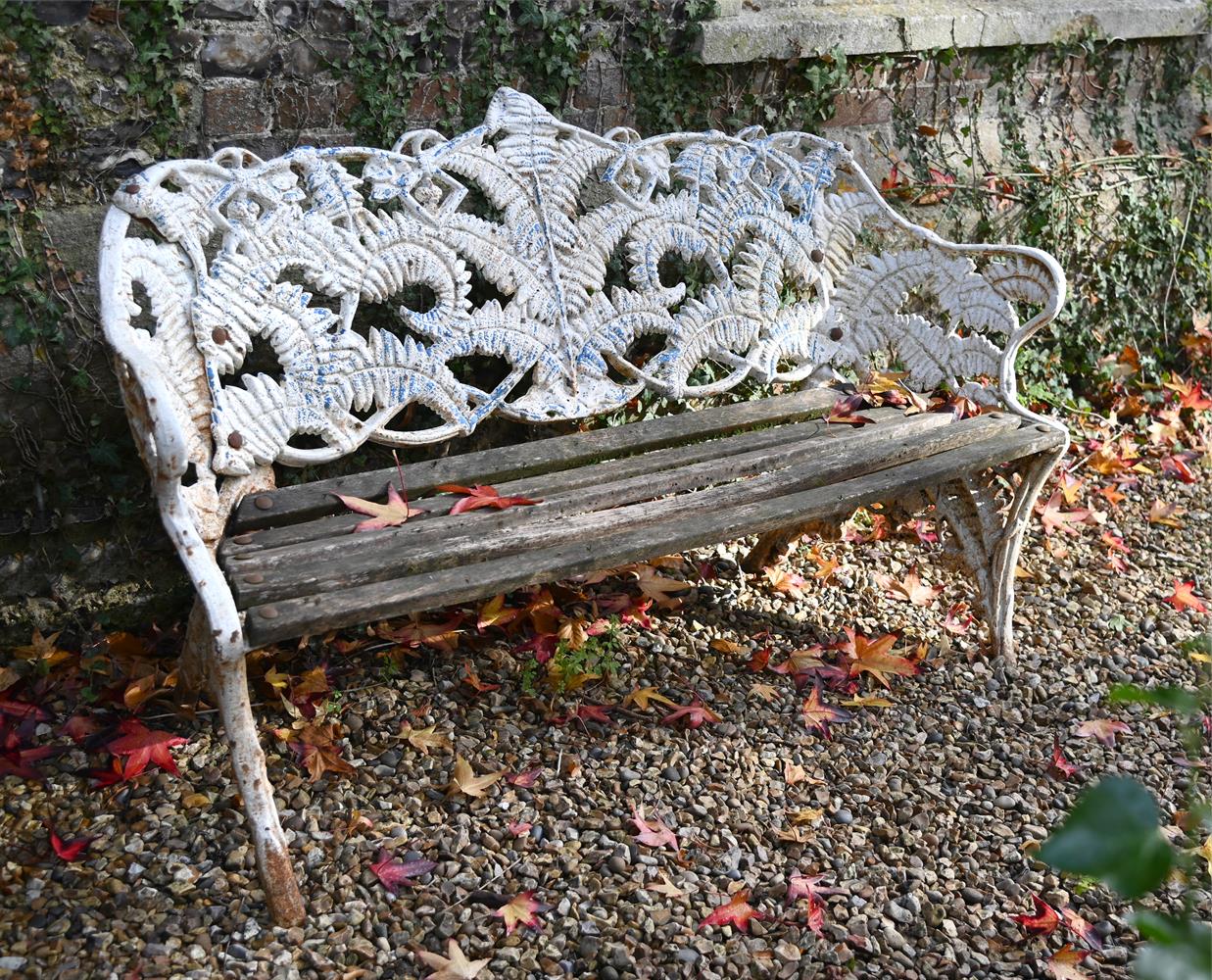 A CAST IRON BENCH IN THE COALBROOKDALE 'FERN AND BLACKBERRY' PATTERN, 19TH CENTURY