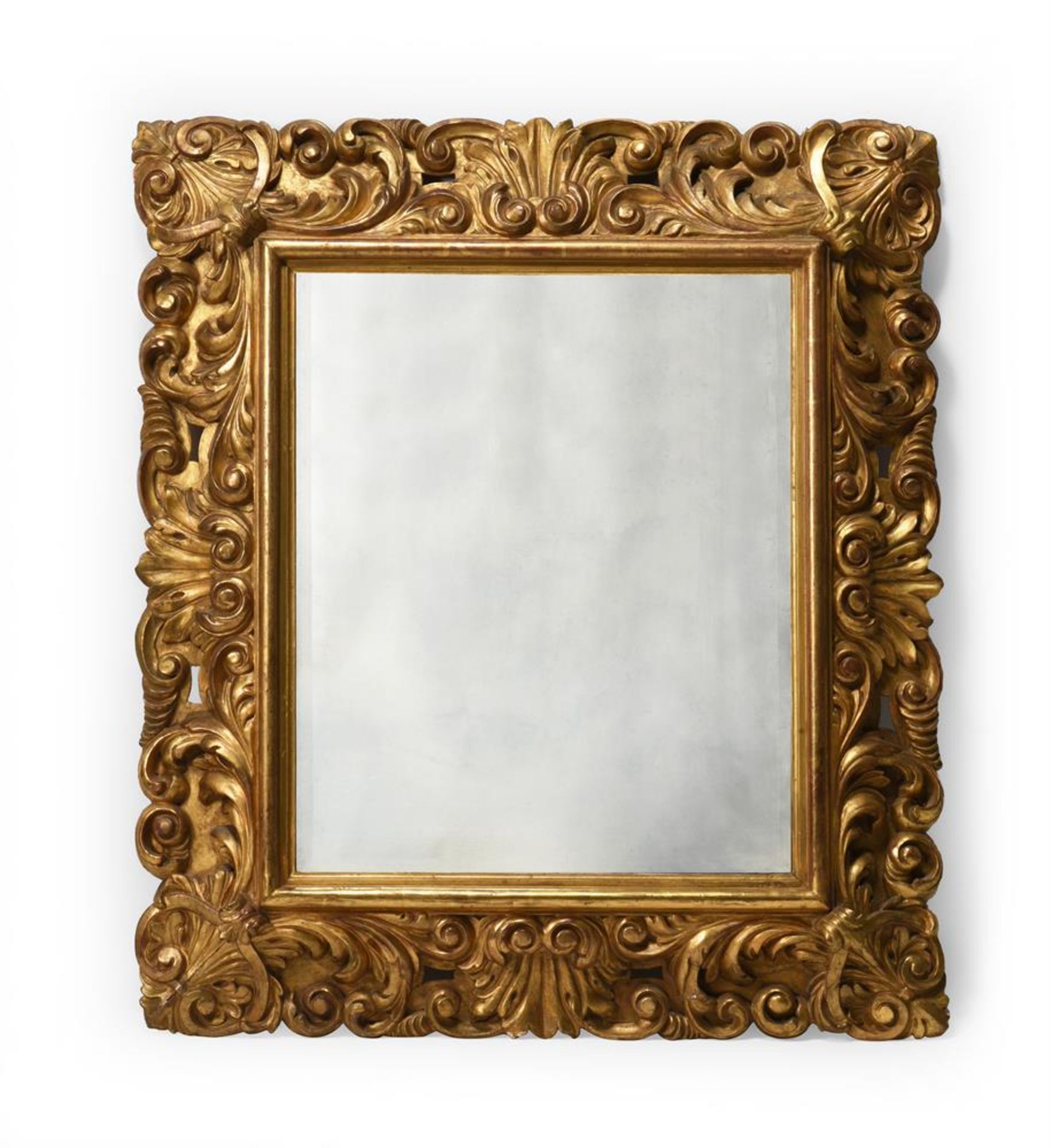 A GILTWOOD CARVED WALL MIRROR, POSSIBLY CONTINENTAL, CIRCA 1840