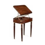 A REGENCY MAHOGANY AND BRASS BOUND CAMPAIGN READING TABLE, CIRCA 1815