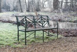 A GREEN PAINTED WROUGHT IRON STRAP WORK GARDEN BENCH, LATE 19TH/EARLY 20TH CENTURY