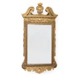 A GEORGE II GILTWOOD AND GESSO MIRROR, CIRCA 1735