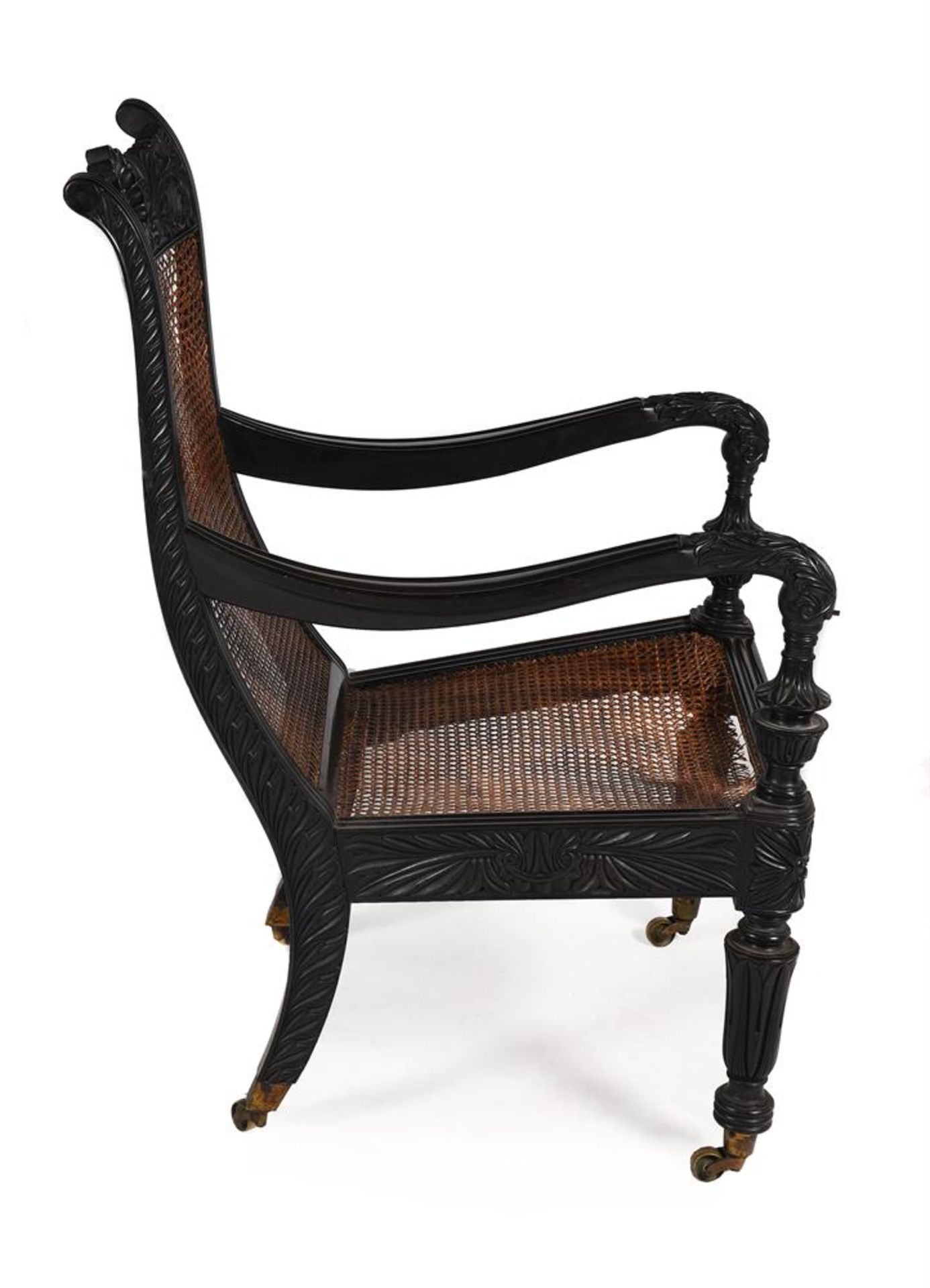 Y A NEAR PAIR OF ANGLO INDIAN CARVED EBONY ARMCHAIRS, MID 19TH CENTURY - Image 8 of 9