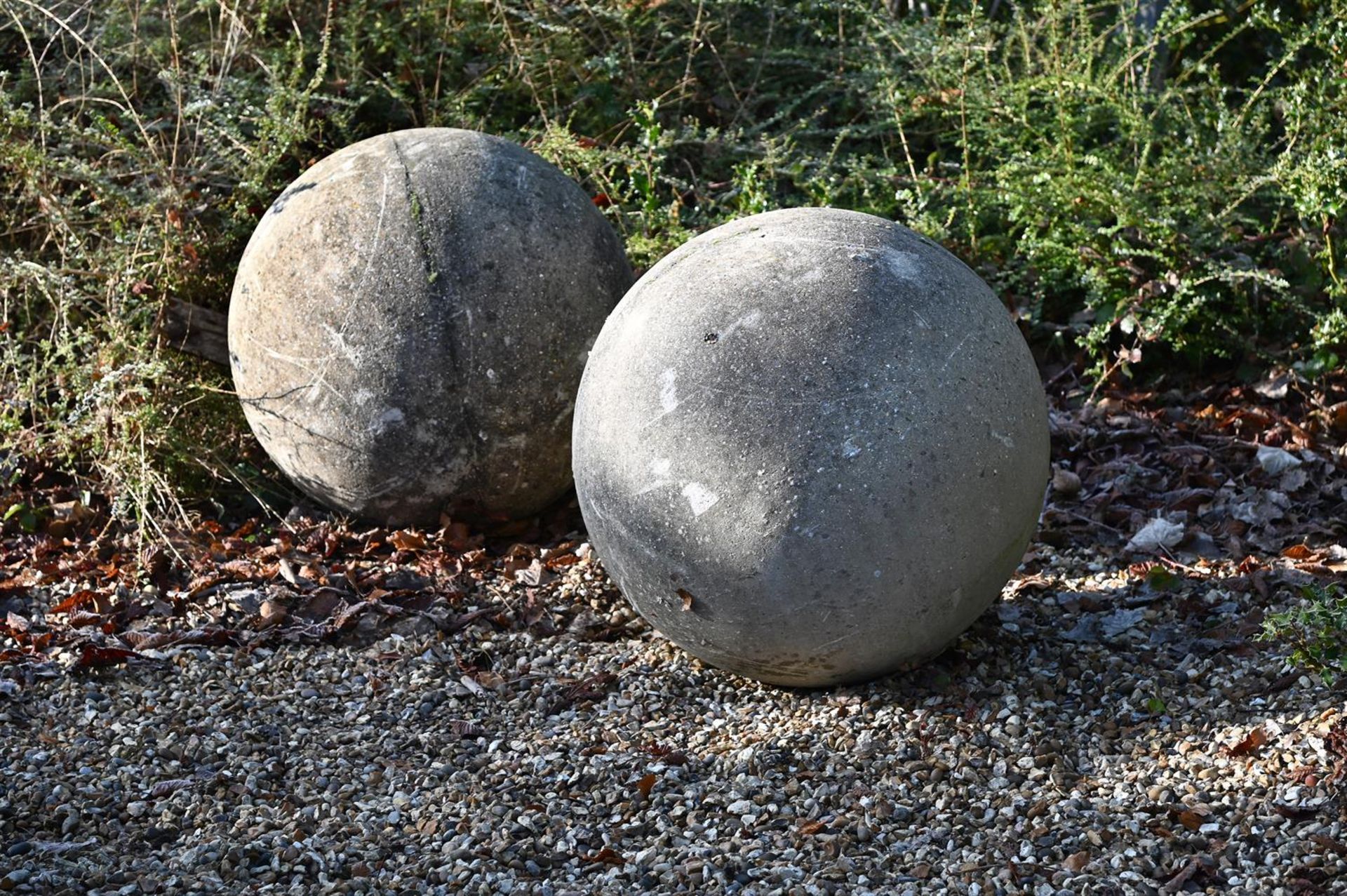 A LARGE PAIR OF STONE COMPOSITION BALLS, 20TH CENTURY