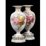 A VERY NEAR PAIR OF BERLIN (KPM) PORCELAIN VASESCIRCA 1900Each painted with bouquets of roses
