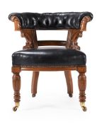 A VICTORIAN OAK AND LEATHER LIBRARY ARMCHAIR, MID 19TH CENTURY
