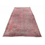 A LARGE TURKISH CARPET, approximately 761 x 473cm