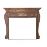 A CARVED PINE FIRE SURROUND IN THE EARLY GEORGE III STYLE, 19TH CENTURY