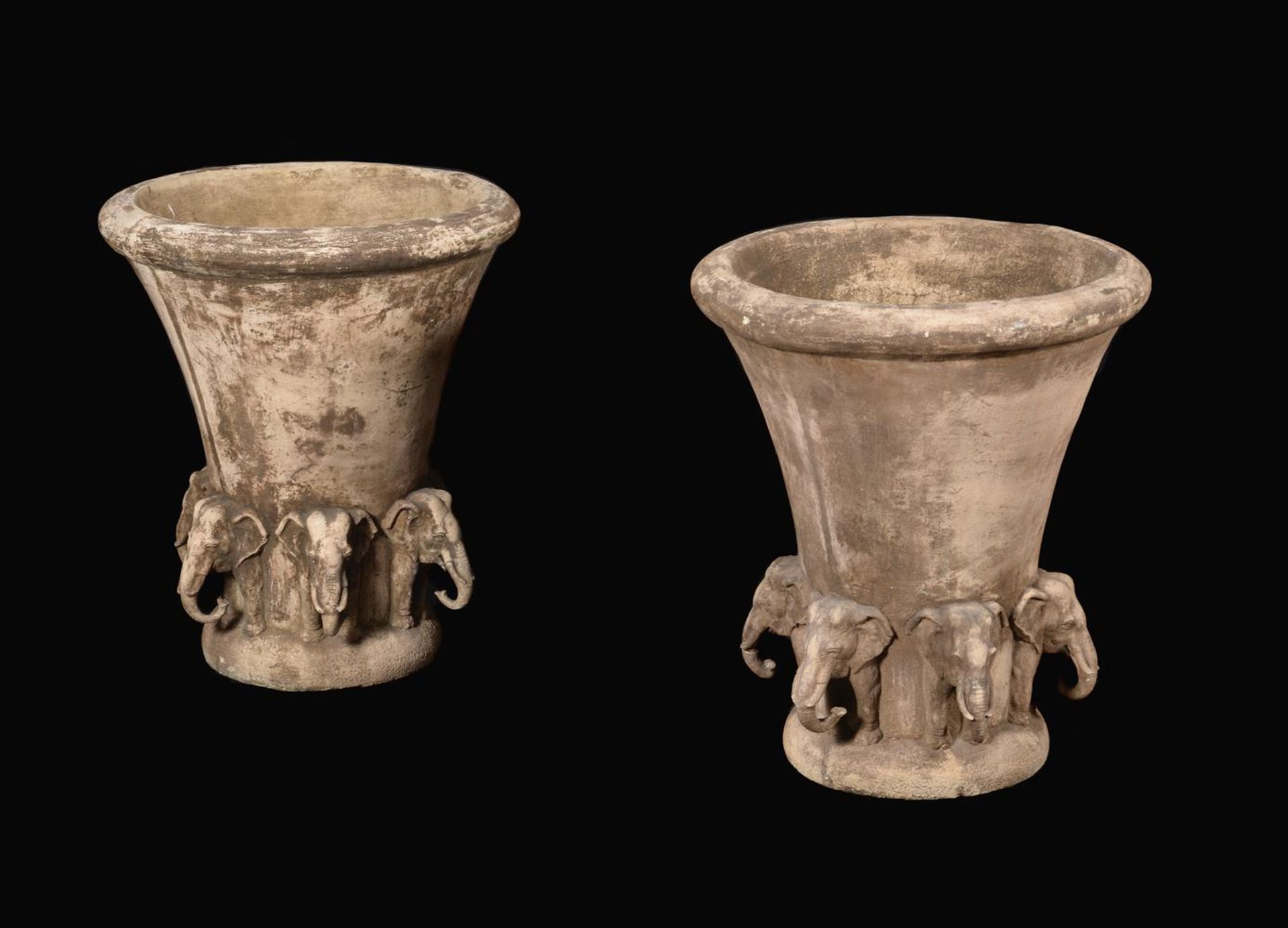 A PAIR OF COMPOSITION STONE URNS WITH ELEPHANT TERMINALS, PROBABLY 20TH CENTURY - Image 2 of 3